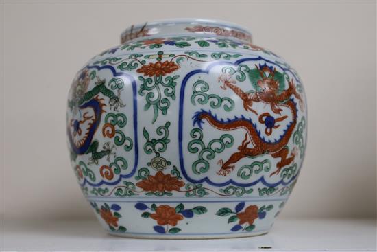 A Chinese wucai dragon jar, Qing dynasty, H. 16.5cm, repair to rim